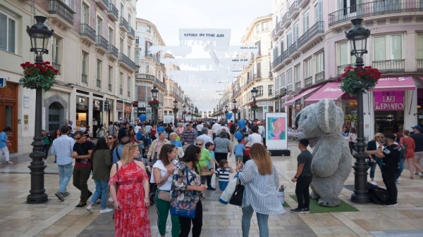 MALAGA, SPAIN - 2019/05/19: People are seen walking on the Calle Larios street during 'The night in white' 2019. Every May, Malaga celebrates a cultural night with more than 200 activities in the city center such as performances, street art, live music and free visits in all museums. (Photo by Jesus Merida/SOPA Images/LightRocket via Getty Images)