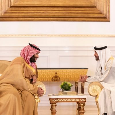 ABU DHABI, UNITED ARAB EMIRATES - November 22, 2018: HH Sheikh Mohamed bin Zayed Al Nahyan, Crown Prince of Abu Dhabi and Deputy Supreme Commander of the UAE Armed Forces (centre R), meets with HRH Prince Mohamed bin Salman bin Abdulaziz, Crown Prince, Deputy Prime Minister and Minister of Defence of Saudi Arabia (centre L), during a reception at the Presidential Airport in Abu Dhabi. 
( Ryan Carter / Ministry of Presidential Affairs )
---